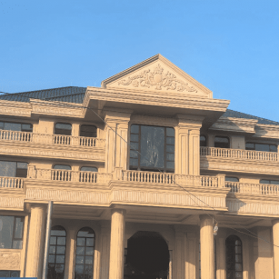 漯河黄金麻别墅外墙干挂石材效果示例