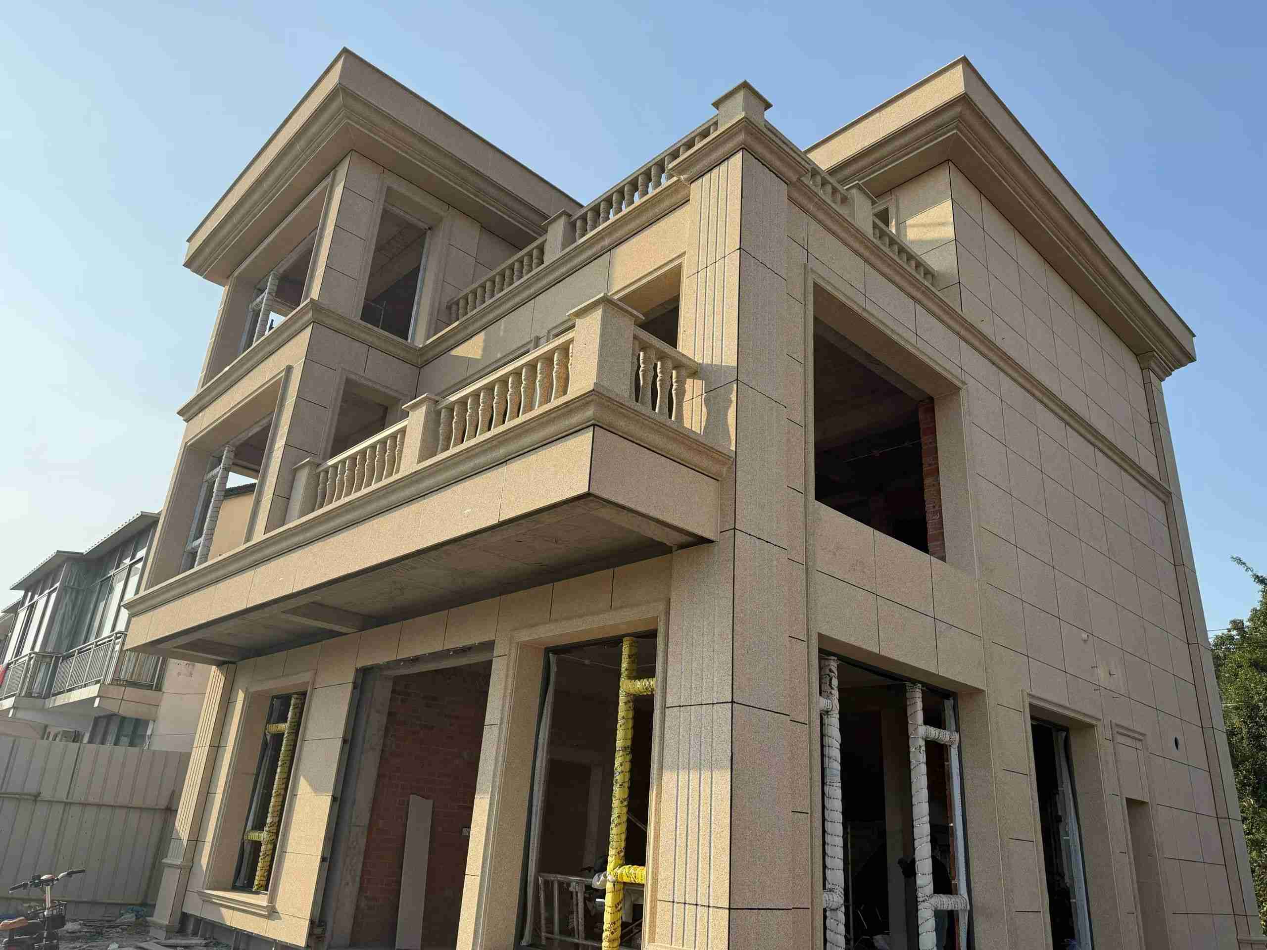 漯河 黄金麻花岗岩石材荔枝面外墙干挂效果展示